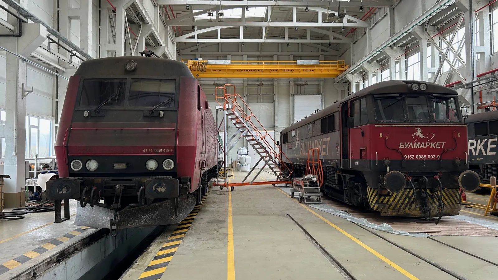Locomotives in the LVZ repair shop, beneath the overhead cranes.